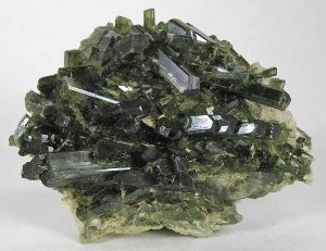 Dark green crystals of diopside, a member of the pyroxene family