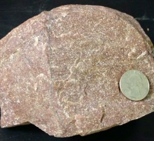 Source: Peter Davis Crystallized rock with interlocking crystals.