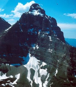 A large and very pointy (almost pyramid-like) mountain