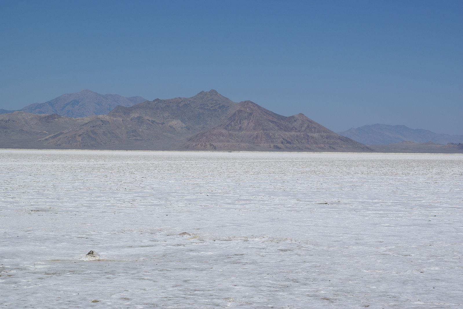 "By The ground is white and flat for a long distance.