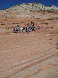 The students are on the red rock