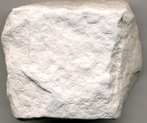 The rock is powdery and white.