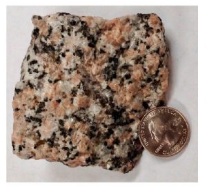 Image showing three or four distinct colors of clearly visible minerals.