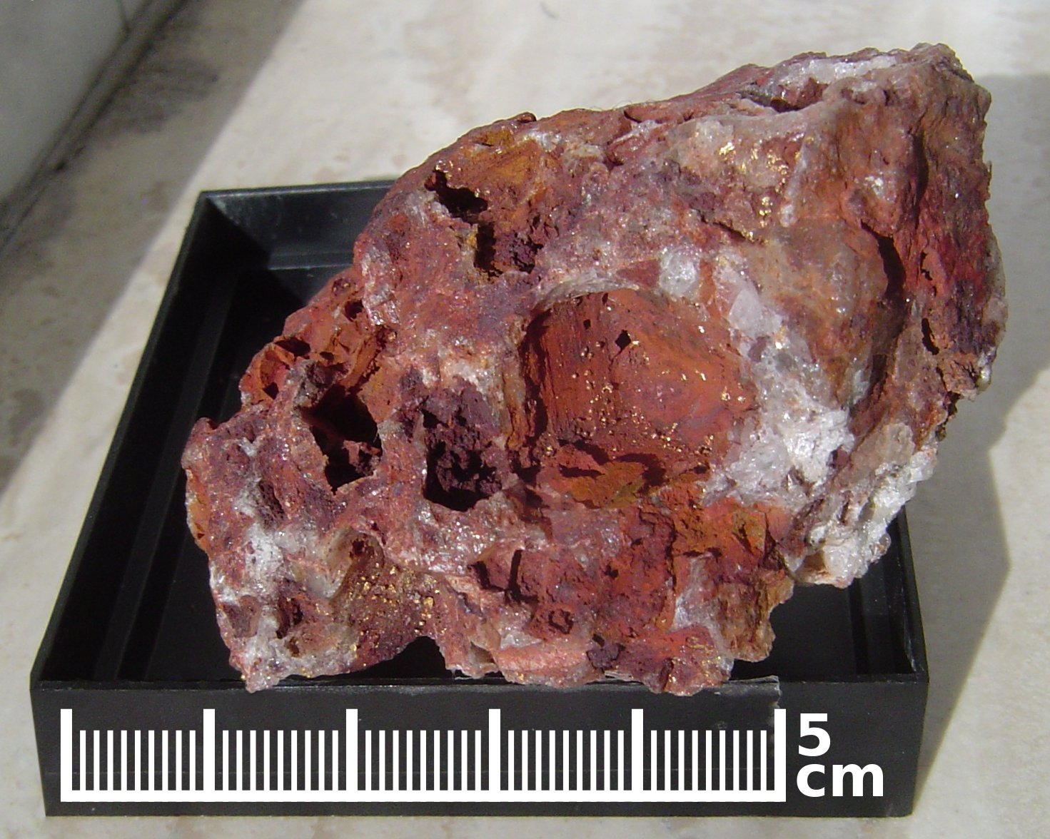 "<a The rock is red.