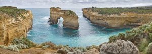Diliff The arch is a rock in the water with a hole in the middle which allows water to pass through.