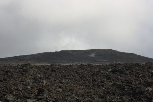 The mountain has low-angle flanks