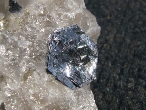 The crystal looks like metal.
