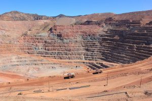 "By The mine contains grey rocks, which are not enriched, and red rocks, which is where the enrichment occurs.
