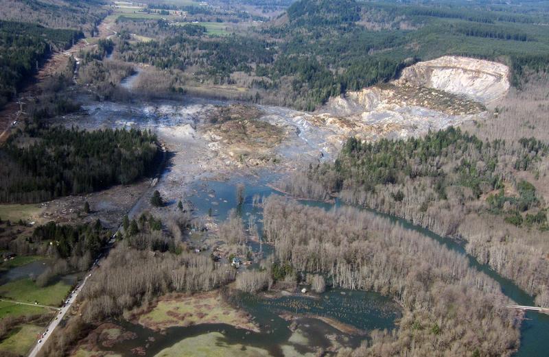 Source: USGS, Public Domain Photo of large slide debris, flood from dammed river, distinct head scarp.
