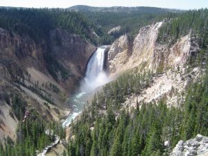 The waterfall is in a valley