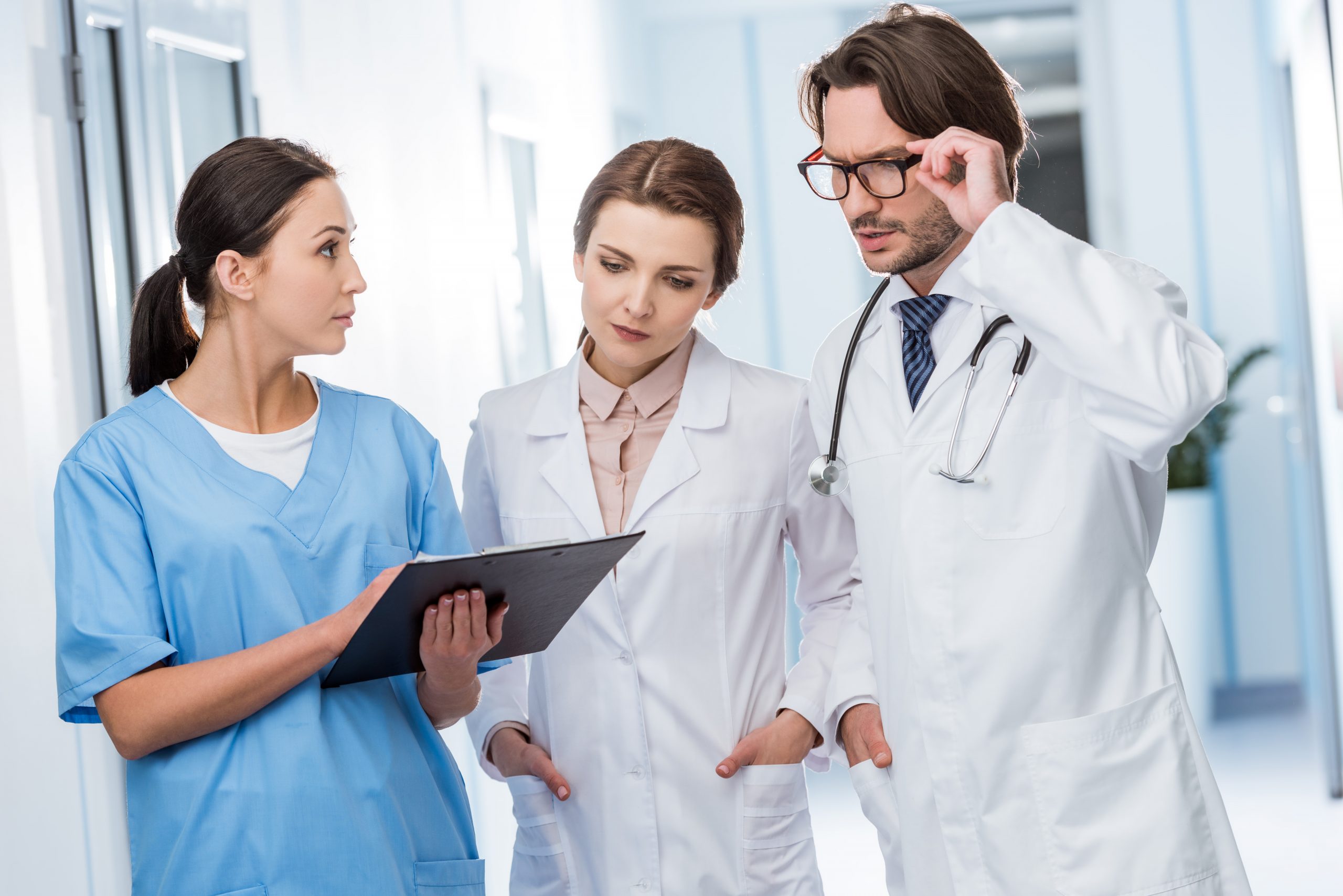 "1322557028-huge.jpg" by LightField Studios is used under license from Shutterstock.com Image showing simulated medical team communicating
