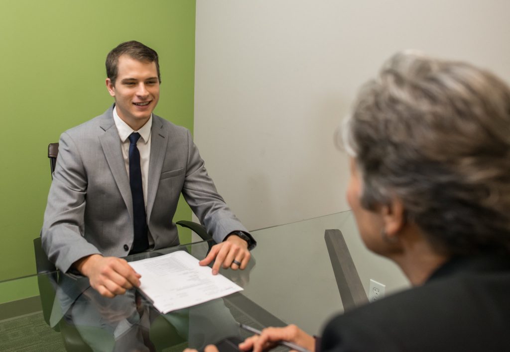 “24835247668_0828e986ad_k.jpg” by Amtec Photos is licensed under CC BY-SA 2.0 Photo showing two individuals engaged in a Simulated Interview