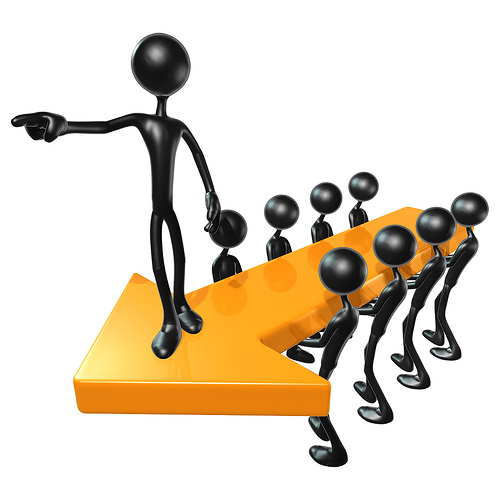 “3D_Team_Leadership_Arrow_Concept.jpg” by lumaxart is licensed under CC BY-SA 2.0 Image showing figures carrying an arrow shape, with another figure standing on top shape