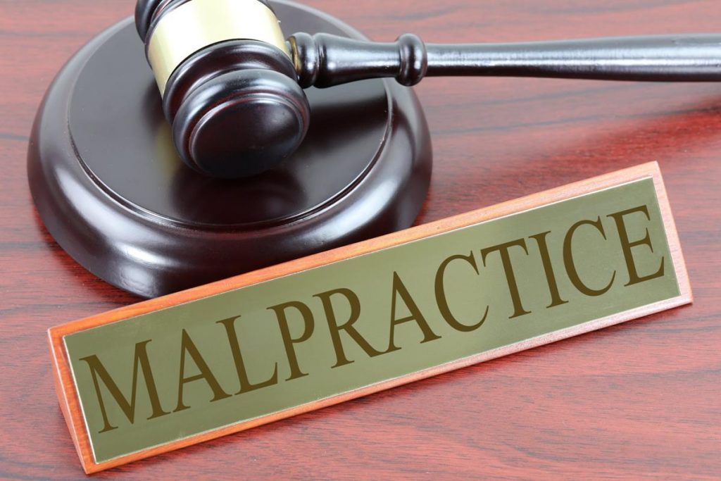 “malpractice.jpg” by Nick Youngson hosted by Pix4free is licensed under CC BY-SA 3.0 Image showing gavel and a sign reading malpractice