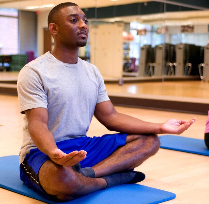 “yoga-class-a-cross-legged-palms-up-meditation-position-850x831.jpg” by Amanda Mills, USCDCP on Pixnio is licensed under CC0 Photo showing a person meditating