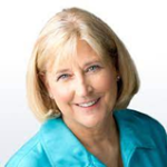 Beck is a middle-aged white woman with bob-cut blonde hair