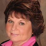 Middle aged woman with short brown hair