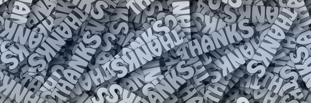 Paper cut outs of the word 'thanks'