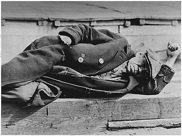Laborer lying down on a pier