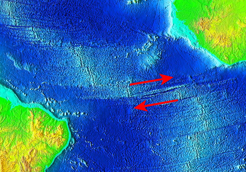 Closeup of the mid-Atlantic ridge system, showing transform faults perpendicular to the ridge axis. Arrows indicate the direction of plate motion on either side of the fault.