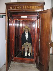 A photograph of the preserved body of Jeremy Bentham on display in the Student Center of the University College of London