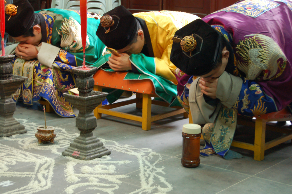 Daoists performing temple rites
