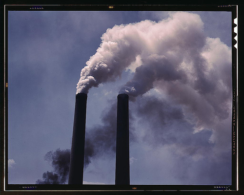 Image of smoke pouring out of stacks polluting the air