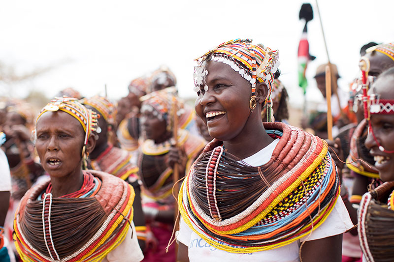 Kenyan women attending a church dedication ceremony