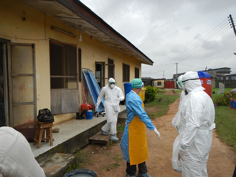 World Health Organization (WHO) workers gear up to enter an Ebola ward in Lagos during the 2013–2016 Ebola pandemic