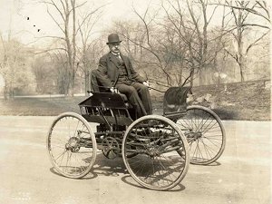 Elwood Hayes in his first automobile.