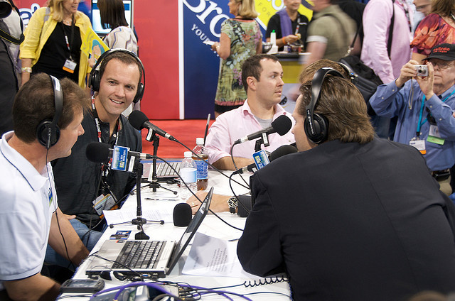Talk show radio hosts at a convention.