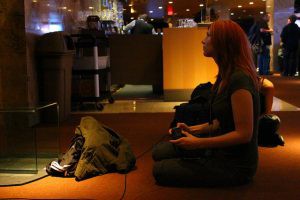 A video game journalist tries out the latest title in an image called “Video Game Journalist,”