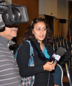 A reporter with 2M TV prepares to speak with Maj. Gen. David R. Hogg, U.S. Army Africa commander, at the Marrakech Security Forum in Marrakech, Morocco.
