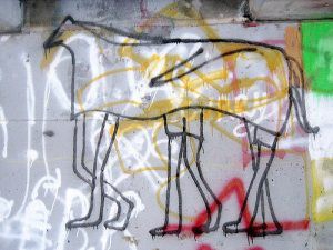 Three-person horse graffiti.