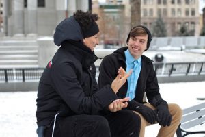 Men talking in the cold
