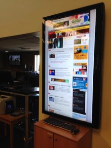 TV displaying KOMU's TV webpage.