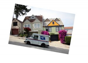 Photo of a mail truck on steep hill.