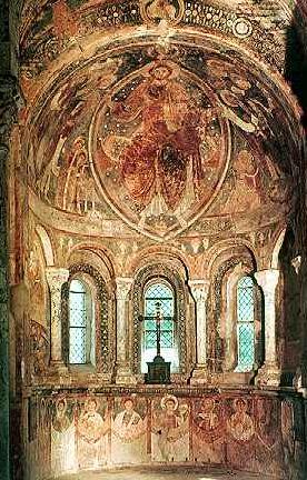 A photo of an apse painting done in a symbolic, rather than naturalistic style.