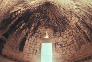 A corbelled ceiling seen from inside the tomb. The viewer looks out the doorway from image 7.92.