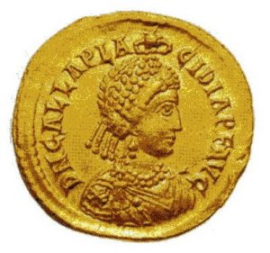 A gold coin with a woman’s bust and writing.