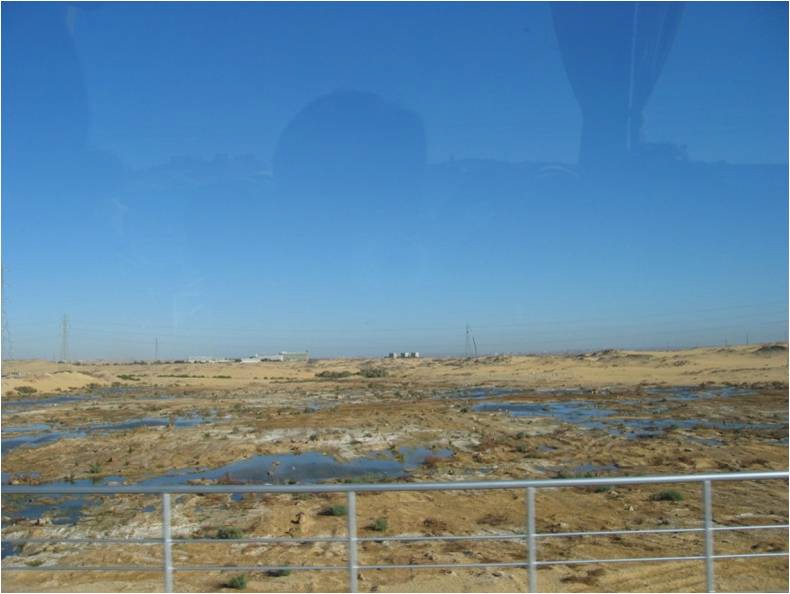 Image of the first cataract of the Nile. Shown is the muddy, rocky surface that made travel a challenge.