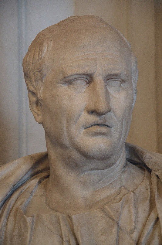 A bust of an old balding man.