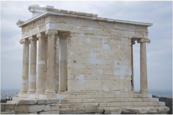 A photo of Athena’s Nike temple demonstrating its small size, steps and ionic capitals.
