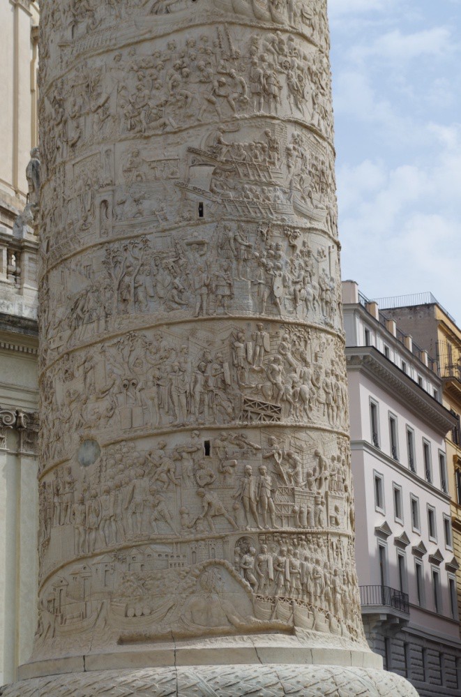 A detail of the column that reveals the windows through which someone climbing the interior stairs could look.