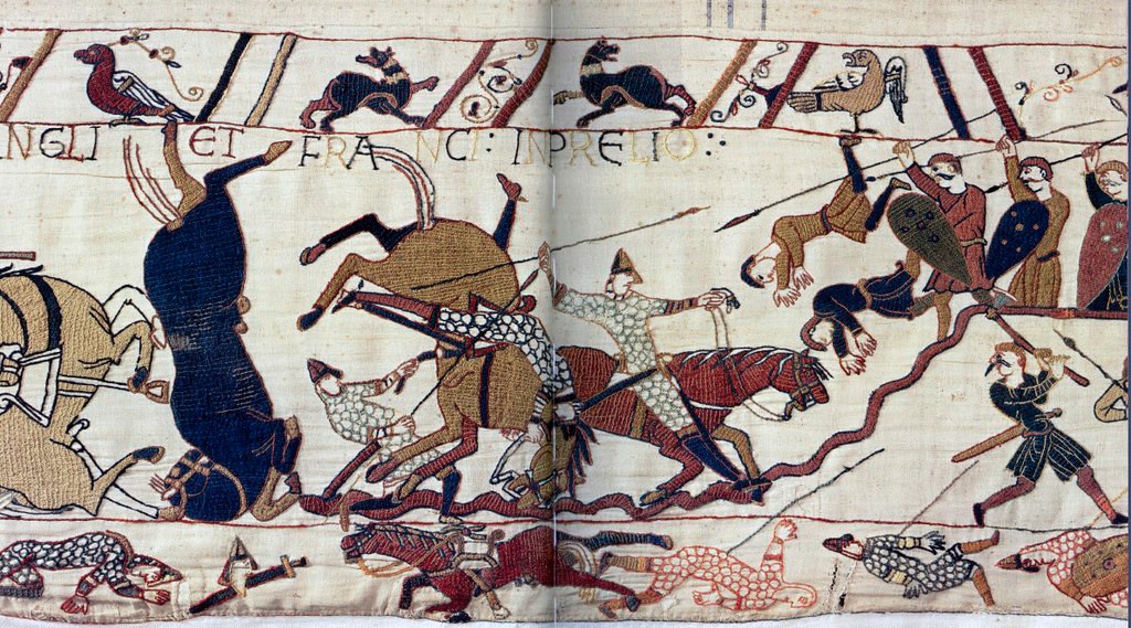Horses and people tumble as men fight with spears.