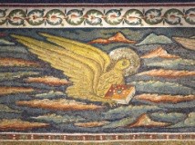 An eagle with a book.