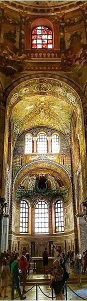 A view of the apse and the area above it. Above the apse windows is the mosaic of the youthful Christ. Above that are three more windows and above those is the highly decorated vault.