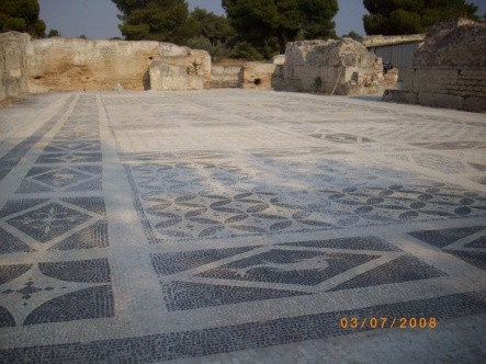 Geometric designs on a mosaic floor.