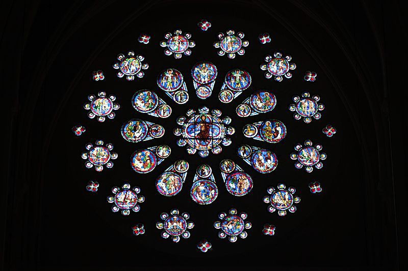 An interior view of the same window reveals only the light coming through the colored glass.