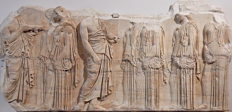 Now headless Greek adults standing neatly in a row. Some are turning to speak to others.